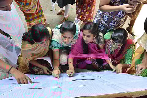 Students checking result at a school. (File Phot | EPS)