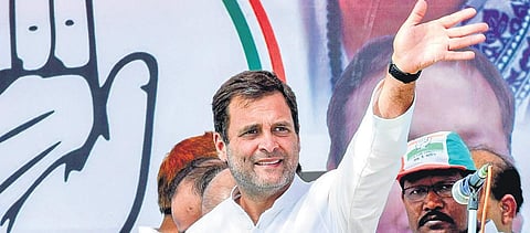 Congress president Rahul Gandhi greets supporters during a campaign rally for the Lok Sabha polls in Purulia, West Bengal. (Photo | PTI)