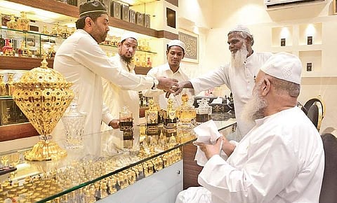 A customer checking out an attar at Imaad Perfumes (Photo | Shriram BN/EPS)