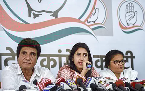 Uttar Pradesh Congress State President Raj Babbar with party MLA Aditi Singh at a press conference in Lucknow Wednesday May 15 2019. | PTI
