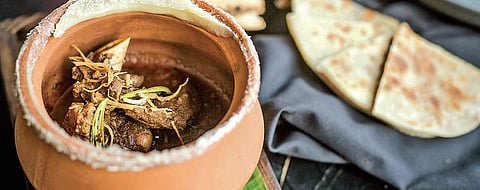 Pahadi inspired chicken with fresh herb sauce served with lemon rice.