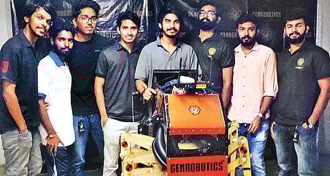 Members of GenRobotics with Bandicoot, the robot