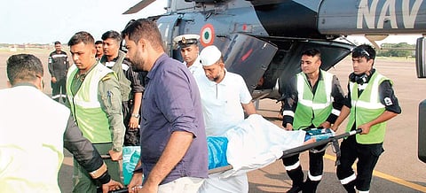 Cheriyabi, a comatose patient from Kavaratti in Lakshadweep being shifted to an ambulance after she was brought to Kochi Naval Base for emergency medical aid in a Navy helicopter on Thursday