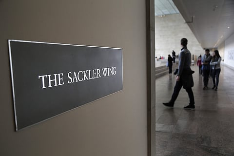 A sign with the Sackler name is displayed at the Metropolitan Museum of Art in New York. (Photo | AP)