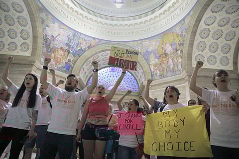 Abortion-rights activists react after lawmakers approved a sweeping piece of anti-abortion legislation, a bill that would ban most abortions in the state of Missouri, Friday, May 17, 2019 in Jefferson, Mo. (Photo | AP)