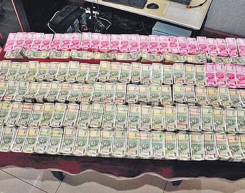 The cash seized from three persons, which, the police said, would have been used to buy gold ornaments illegally I P Ravindra Babu