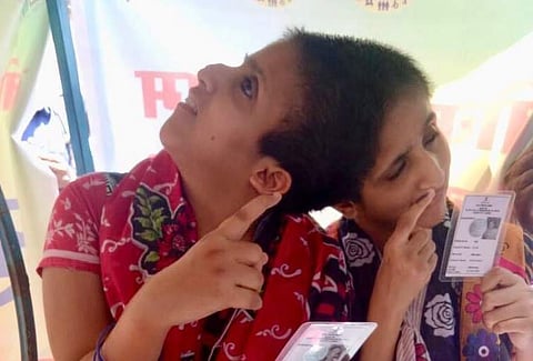 Conjoined sisters Sabah and Farah cast their votes as separate individuals with independent voting rights for the first time. (Photo | ANI)