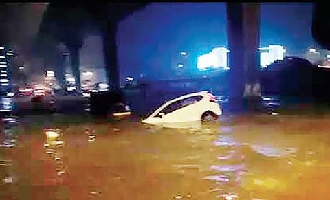 File photo of a half-submerged car
