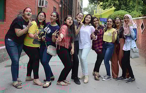 Students celebrate after the CBSE class 12th results were declared in New Delhi. (Photo| Naveen Kumar, EPS)