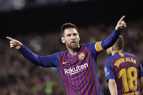 Barcelona's Lionel Messi celebrates after scoring his side's third goal during the Champions League semifinal first leg against Liverpool (Photo | AP)