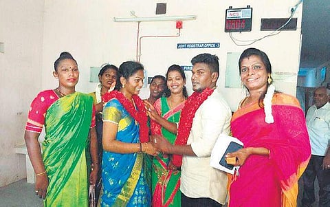 The couple exchanging garlands at the registrar office | Express