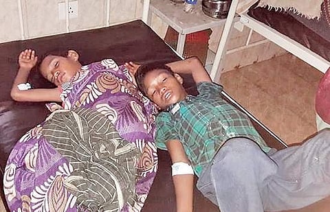 Two of five children who fell ill after consuming toddy are undergoing treatment at Paderu area hospital in Visakhapatnam district on Monday | express