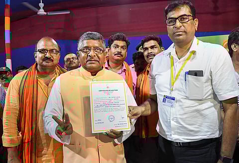 Union Law Minister Ravi Shankar Prasad receives the winning certificate following his victory in Bihar's Patna Sahib in the Lok Sabha elections on 23 May 2019. (Photo | PTI)