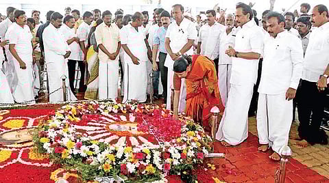 DMK president MK Stalin led newly elected MPs and MLAs of his party to the memorials of former Chief Ministers CN Annadurai (Anna) and M Karunanidhi on the Marina on Saturday and paid homage to them | Express