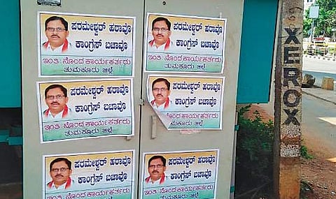 Posters of Dy CM G Parameshwara that were put up during his visit in Tumakuru
