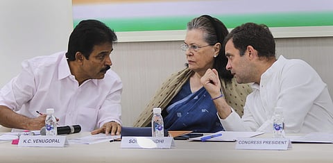 Congress President Rahul Gandhi with senior party leader Sonia Gandhi and KC Venugopal at the Congress Working Committee CWC meeting in New Delhi Saturday May 25 2019. | PTI