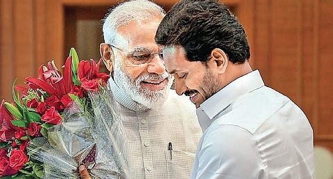 YSR Congress president and Andhra Pradesh CM-designate Y S Jagan Mohan Reddy greets PM-elect Narendra Modi at the latter’s New Delhi residence on Sunday | pti