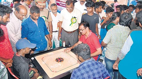 Shanmugam, Managing Director, TNSCB, plays carrom with the boys in Perumbakkam | Express