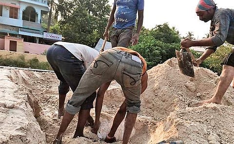 The narcotic hidden under phosphogypsum in a lorry being dug out in Vijayawada| EXPRESS