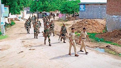 Security forces inspect one of the violence-prone villages in Guntur district | Express