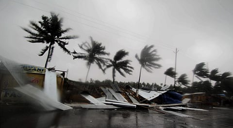Extremely Severe cyclonic storm Fani made landfall on the Odisha coast near Puri at 8 AM. IN PIC: Street shops are seen collapsed due to gusty winds preceding the landfall of cyclone Fani on the outskirts of Puri.