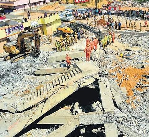 File pictures of the building which collapsed in Dharwad in March