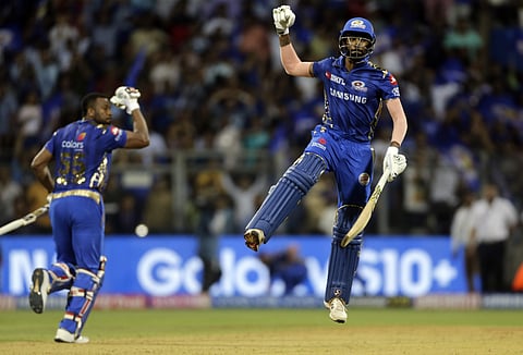Hardik Pandya celebrates with Kieron Pollard after scoring the winning runs for MI in their super over win against SRH (Photo | AP)