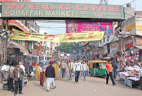 The congested stretch, lined by branded stores, is popular with shoppers.