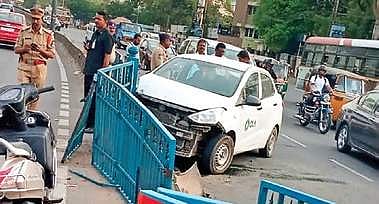 Ola cab rams railing near CM camp office