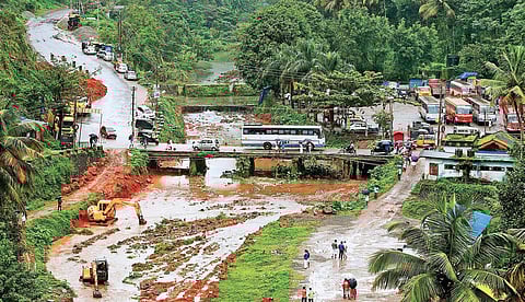A file picture of the Periyar and Cheruthoni town before the August floods (R) The bridge at Cheruthoni constructed by a Canadian company to transport construction material to Idukki dam site, withstood the devastating flood