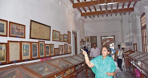Promoda Devi Wadiyar explaining the ongoing renovation work at the Jaganmohan Palace in Mysuru on Wednesday | Udayashankar S