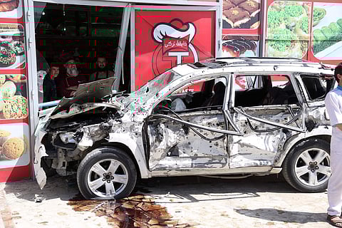 A burned out vehicle sits at the site of a suicide attack in Kabul, Afghanistan, Friday, May 31, 2019. A suicide car bomb exploded early Friday morning in an eastern neighborhood of the capital Kabul, leaving seven casualties, police said. (Photo | AP)
