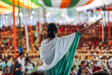 Mamata Banerjee, chief minister of West Bengal, speaks to supporters during a rally in Swarupnagar, West Bengal, on April 29. (Photo | Prashanth Vishwanathan/Bloomberg)