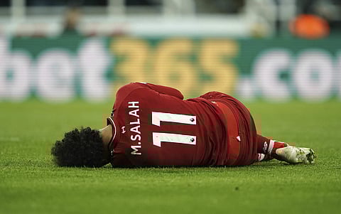 Salah was stretchered off at St James' Park on Saturday due to a head knock | AP