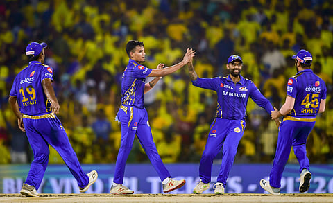 Mumbai Indian bowler Rahul Chahar celebrates with teammates after dismissing Chennai Super Kings batsman Faf du Plessis during the First Qualifier cricket match of Indian Premier League 2019. (Photo | PTI)