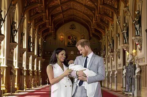 Britain's Prince Harry and Meghan, Duchess of Sussex, during a photocall with their newborn son, in St George's Hall at Windsor Castle, Windsor, south England, Wednesday. (Photo | AP)