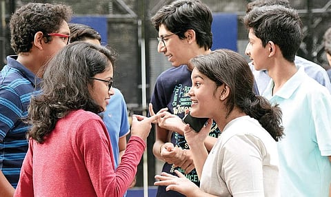 Students share a light moment after the announcement of ICSE results at a city school on Tuesday | Nagaraja Gadekal