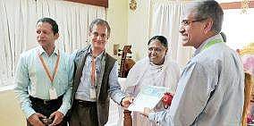 An MoU signed between the Amrita University and Rural Development Ministry in the presence of Venkatrangan (Vice-Chancellor, Amrita University), Kamal Bijlani, (Head, E-Learning Research Lab, Amrita University), Amma (Chancellor, Amrita University)and Dr