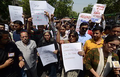 Journalists shout slogans during a protest against the arbitrary arrest of Prashant Kanojia and other journalists by UP police in New Delhi on 10 June 2019. (Photo | Naveen Kumar, EPS)
