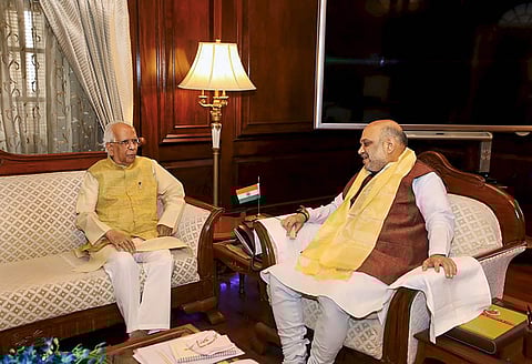 Home Minister Amit Shah meets West Bengal Governor Keshari Nath Tripathi. (Photo|PTI)