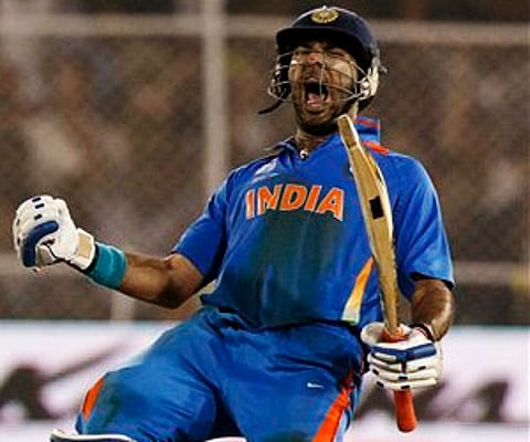 Yuvraj Singh celebrates after hitting the winning runs against Australia in the quarterfinal match of the ICC Cricket World Cup 2011. (Photo | AP)