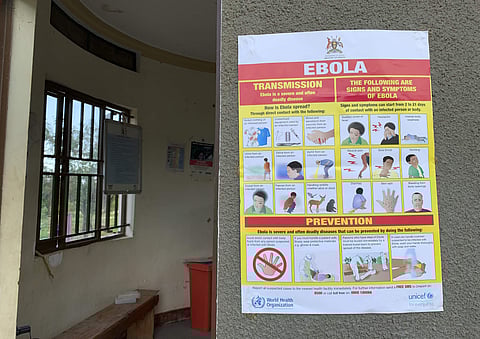 This photo taken Thursday, April 18, 2019 and released by the International Rescue Committee (IRC), shows an Ebola-prevention information sign at the Ndaiga Health Centre II, near the shores of Lake Albert and the border with Congo, in Kagadi district, we