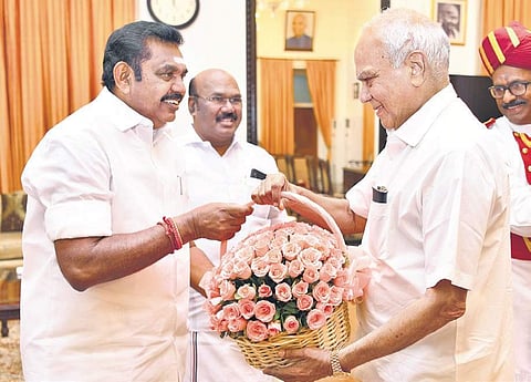 Chief Minister Edappadi K Palaniswami on Wednesday greeting Governor Banwarilal Purohit with a bouquet in the presence of Fisheries Minister D Jayakumar | Express