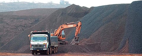 A lorry and an earth-mover at a mining site at Kamathur village in Ballari district. Image used for representational purposes.