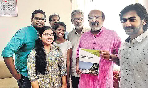 Finance Minister Thomas Isaac releasing the study report prepared by NGO Thanal on plastic litter along the Kerala Coast