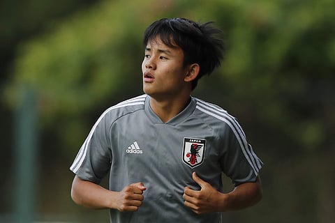 Japan's Takefusa Kubo runs during a training session of the national soccer team in Sao Paulo, Brazil. (Photo | AP)