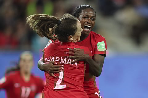 Canada's Nichelle Prince, right, celebrates with Canada's Allysha Chapman after scoring her side's second goal during the Women's World Cup Group E soccer match between Canada and New Zealand in Grenoble, France. (Photo | AP)