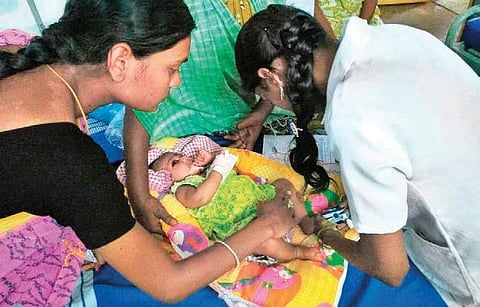 One of the infants, who was administered wrong medication at a health camp in Chirala. (Photo | EPS)