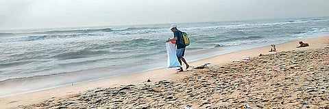 Nagaraj V has ditched his sports shoes and plogs on bare feet