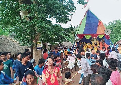 Devotees pulling chariot of the Trinity at Gudialbandh on Monday. (Photo | EPS)